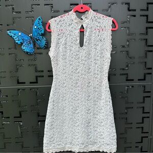 Bebe size L, lace mini dress in off white, greyish stretch sleeveless high neck